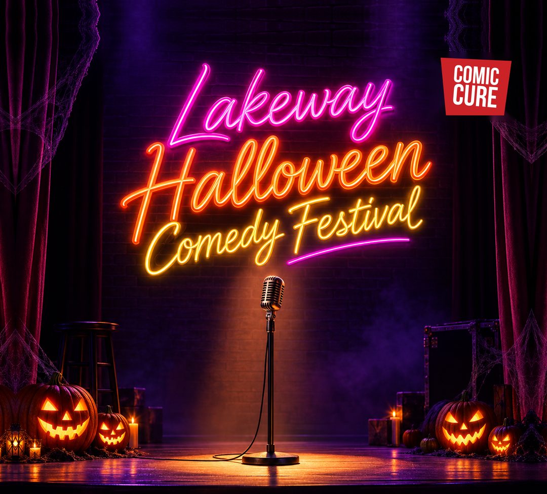 Neon festival sign over an empty stage with a microphone and carved pumpkins